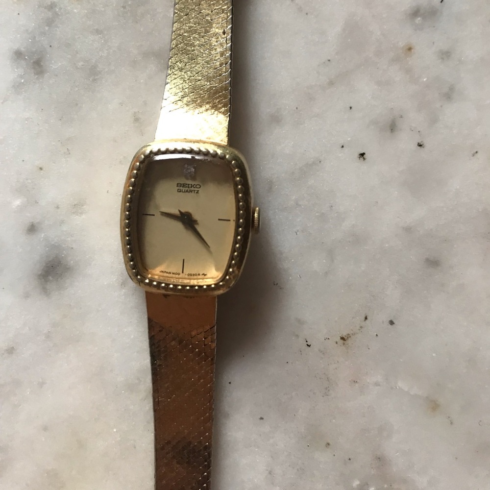 Vintage gold diamond Seiko watch women’s dainty
Princess Diana style bevel